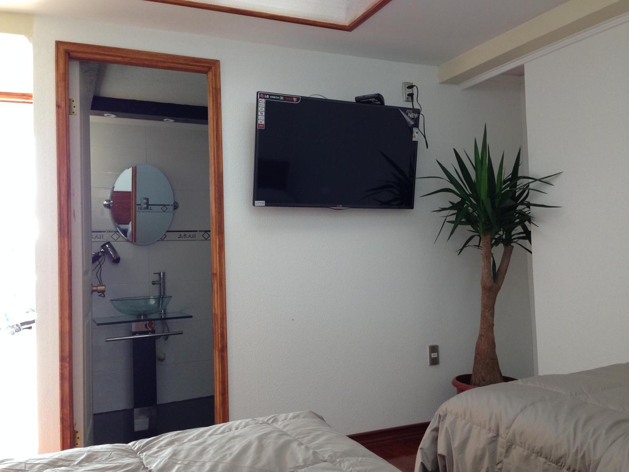 Residencial Victoria Said Hotel Линарес Стая снимка